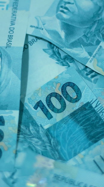 a-pile-of-ten-hundred-dollar-bills-sitting-on-top-of-each-other.jpg a pile of ten hundred dollar bills sitting on top of each other